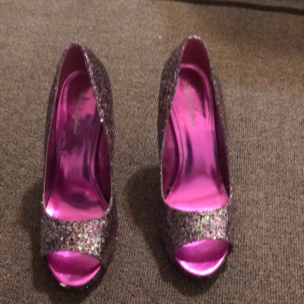 A peep toe high heel gitler shoe